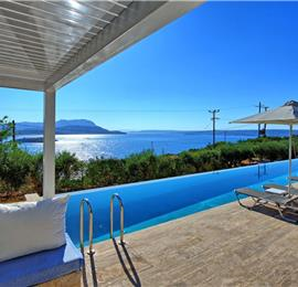 5 bedroom luxury villa with infinity pool, sea views and tennis court near Chania, sleeps 10